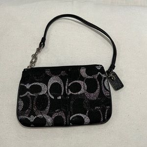 Sparkly black wristlet from COACH